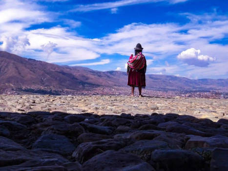 Bolivia - Praying Bolivian lady