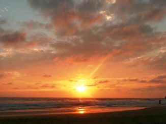 Montañita - Zonsondergang op het strand